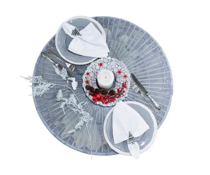 Serving round Christmas table for a winter wedding in gray with bright red Stock Photos
