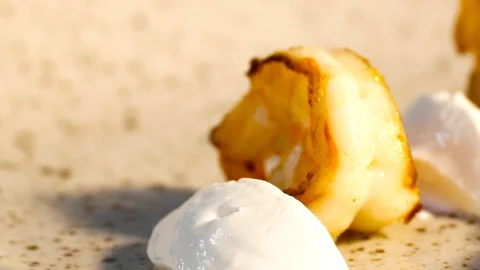 Serving salad with tiger prawns Stock Footage 99437895