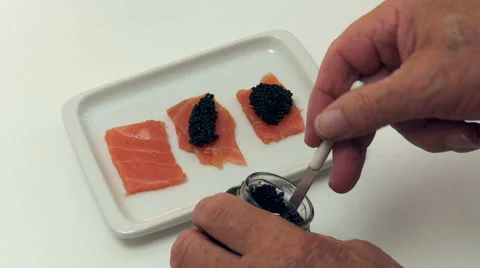 Serving salmon &amp; caviar Stock Footage 44189787