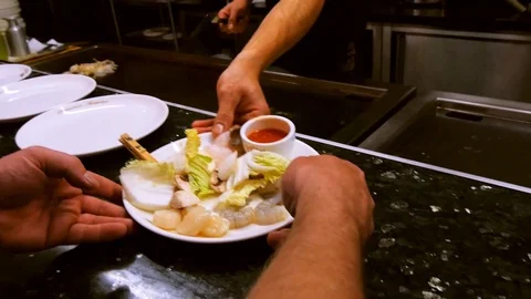 Serving sauce at the restaurant Stock Footage 89932962