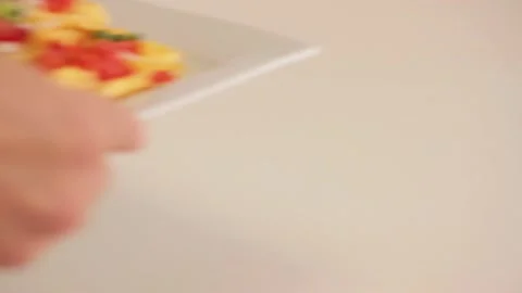 Serving scrambled eggs in a white plate Stock Footage 133815004