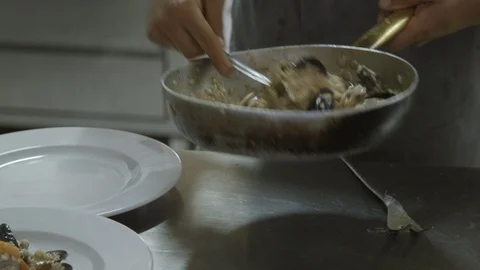 Serving seafood risotto Stock Footage 86203658