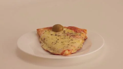 	Serving a slice of cold mozzarella pizza	 Stock Footage 133816084