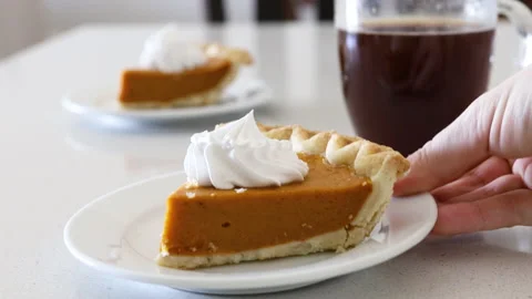 Serving a Slice of Pumpkin Pie Stock Footage 143187783