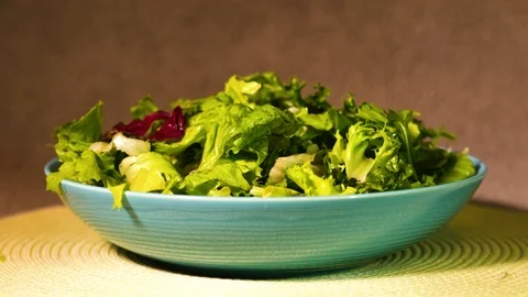 Serving sliced salad Stock Footage 101964886