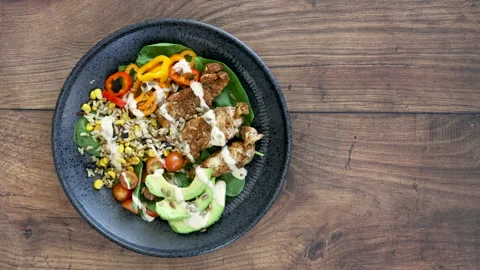 Serving a Southwest Chicken Salad Stock Footage 140656254