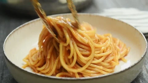 Serving the spaghetti in a plate. Stock Footage 202072653