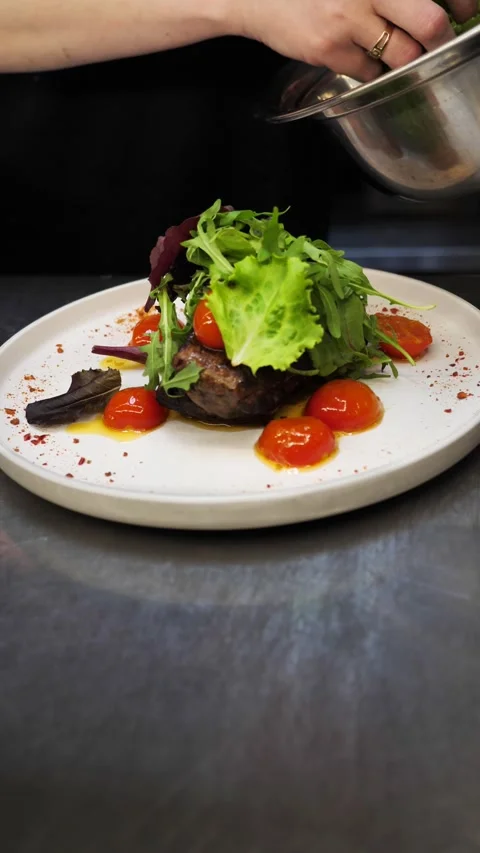 Serving Steak with Vegetables and Tomato-Basil Sauce .time-lapse video Stock Footage 338033315