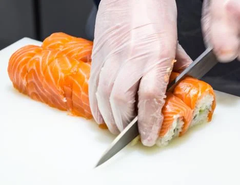 Serving sushi Stock Photos