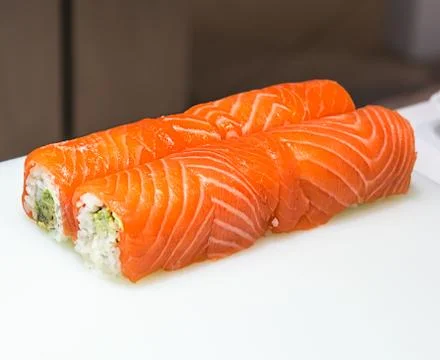 Serving sushi Stock Photos