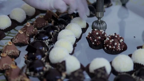 Serving a sweet festive table with cakes Stock Footage