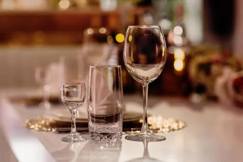 Serving on the table. Crystal glasses. Wedding. Banquet. Stock Photos