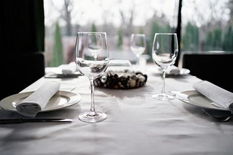 Serving table. wine glasses, plates, napkins and cutlery. design of table Stock Photos