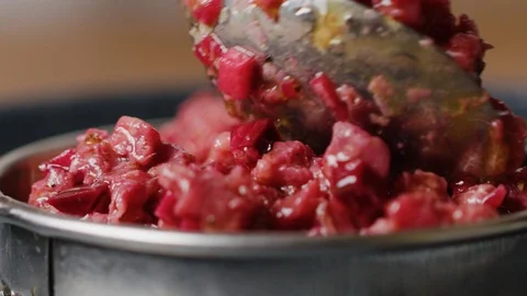 Serving Tar Tar on dish macro shot, five star meal Stock Footage 128485302