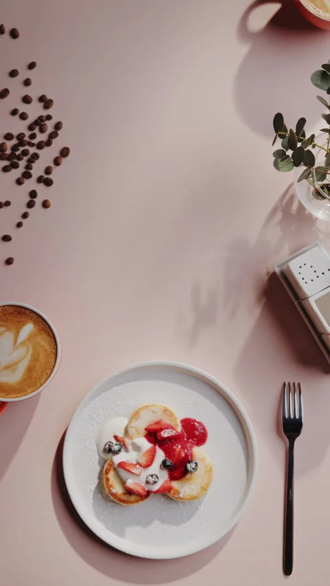 Serving tasty breakfast dessert dish with pancakes and friuts by waiter on the Stock Footage 156865405
