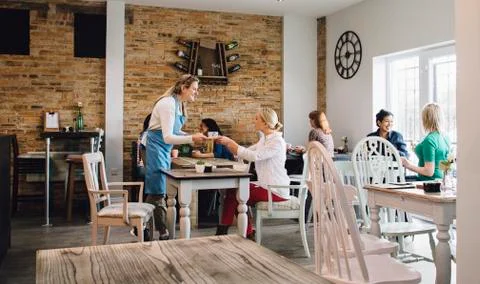 Serving Tea In Cafe Fotos Stock