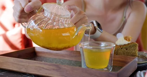 Serving tea in a glass cup Stock Footage 234840207