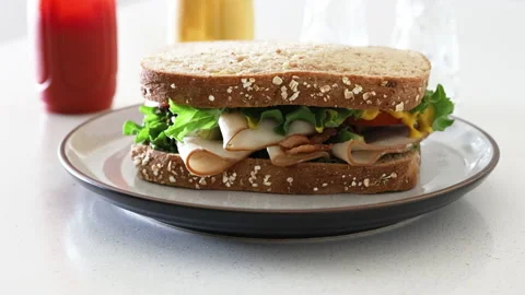 Serving a Turkey Sandwich Stock Footage 140656900
