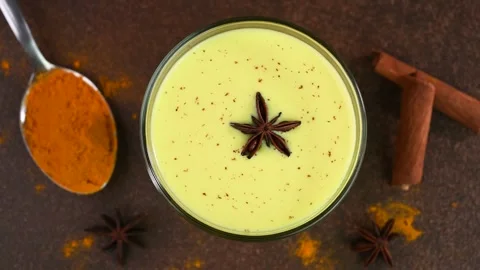 Serving turmeric milk 動画素材 308315098