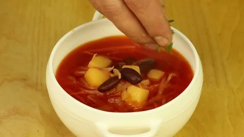 Serving vegetarian soup Stock Footage 72770747