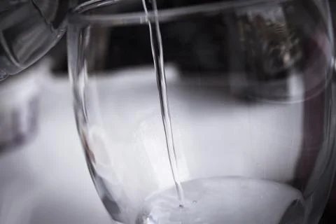 Serving water from a plastic bottle Foto stock