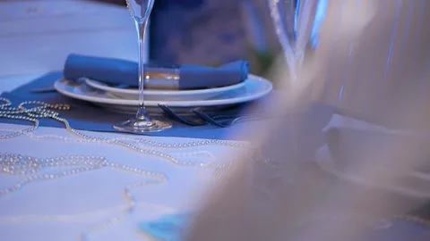Serving of wedding table. Empty glasses closeup. Banquet decorated table Stock Footage 127621247