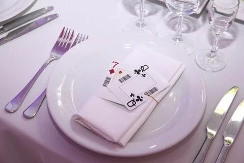 Serving the wedding table with playing cards in the gangster style Stock Photos
