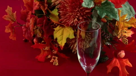 Serving white wine with fall foliage Stock Footage