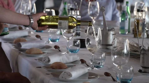 Serving white wine at restaurant Stock Footage 127868970