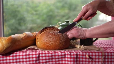 Serving wholemeal baked bread at breakfast Stock Footage 164401473