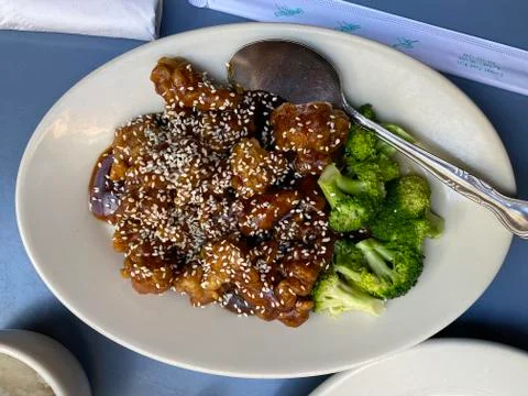 Sesame Seed Chicken with Broccoli Stock Photos