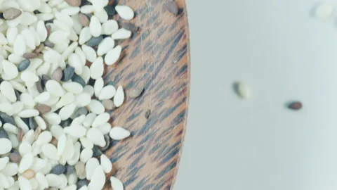 Sesame Seeds Side Rotation close up Stock Footage 248757238