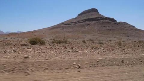 Sesfontein camera car, dry landscape, mountains, Namibia, Africa in HD Stock Footage 90924124