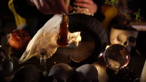 Session of black magic with the skull of a goat by candlelight Stock-Footage 132672026