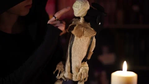 Session of black magic with voodoo doll 스톡 동영상 133077384
