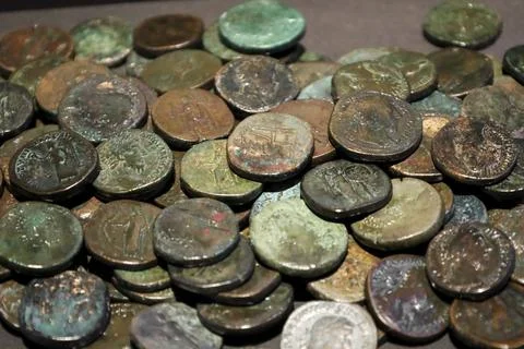 Sesterces hoard on black background Stock Photos
