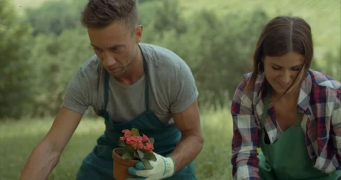 Set 03A-00043102nice couple doing gardening together. shot in slow motion Stock Footage 92797491