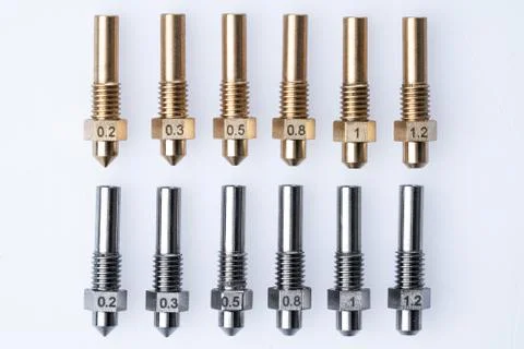 Set of 3D printer nozzles in different sizes on a white background Foto stock