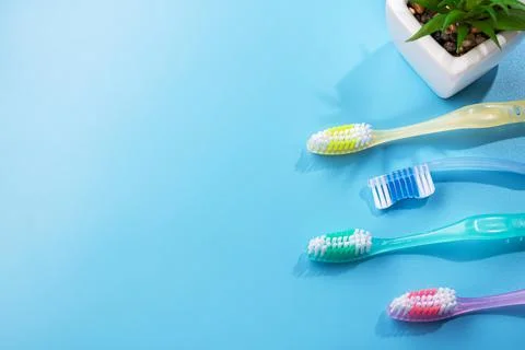 Set of 4 new plastic toothbrushes Stock Photos