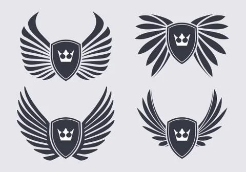 Set of 4 pair of stylish decorative vector wings with shields and crowns Stock Illustration