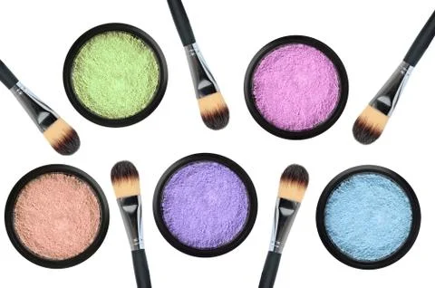 Set of 5 eyeshadows and brushes isolated on white background Stock Photos