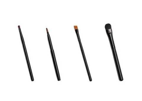 A set of 6 make-up brushes, shot on white background Stock Photos