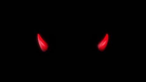 Download A Devil With Red Eyes And Horns On His Face Wallpaper