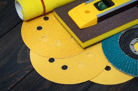 A set of abrasive tools and building level for cleaning or sanding various Stock Photos