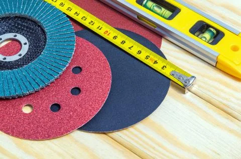 A set of abrasive tools and building level for cleaning or sanding various Stock Photos