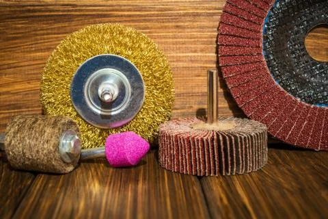 Set of abrasive tools and sandpaper on vintage wooden boards, wizard is used Stock Photos