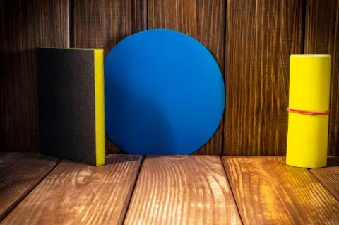 Set of abrasive tools for grinding on the background of old wood. Stock Photos