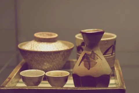 A set of antique ceramic dishes with a pattern on the glaze Stock Photos
