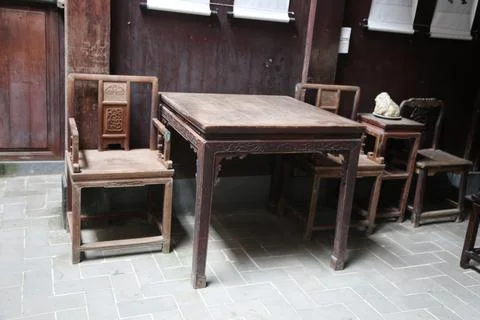 A set of antique furniture, a rectangular table with four chairs around it,.. Stock Photos