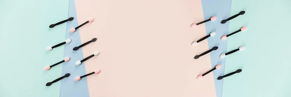 Set of applicators for applying shadows on multicolored background. Banner. Stock Photos